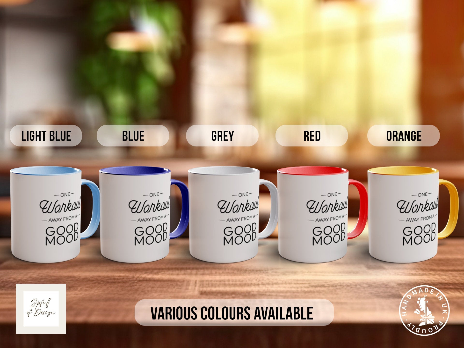 a group of coffee mugs sitting on top of a wooden table