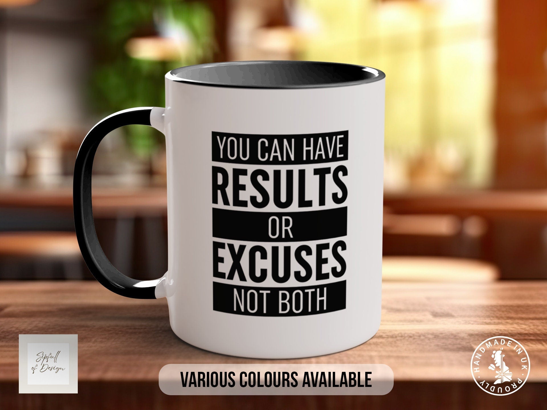 a white and black coffee mug sitting on top of a wooden table